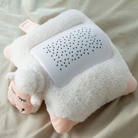 Plush Toy Projector Sheep InnovaGoods with star projection feature on a soft surface.