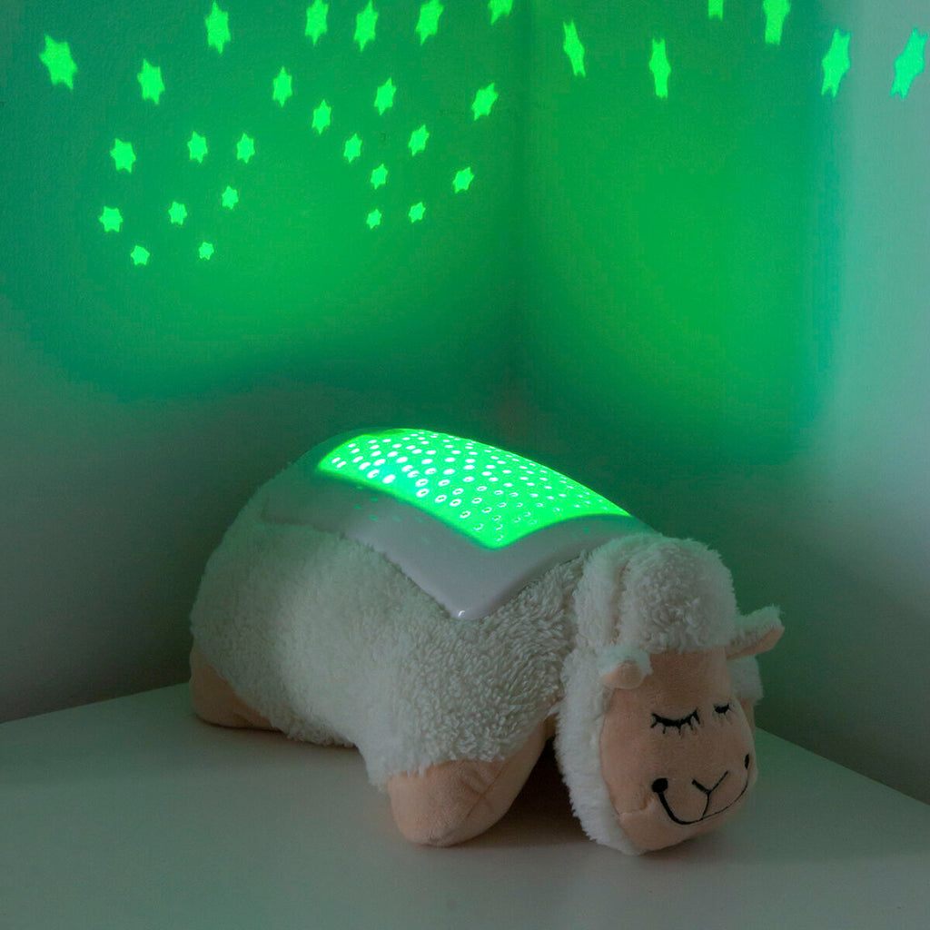 Plush Toy Projector Sheep InnovaGoods with green star projection in a cozy room setting.